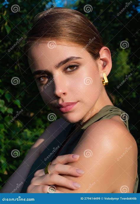 Girl Beauty Face On Palm Leaves Summer Portrait Of Beautiful Young