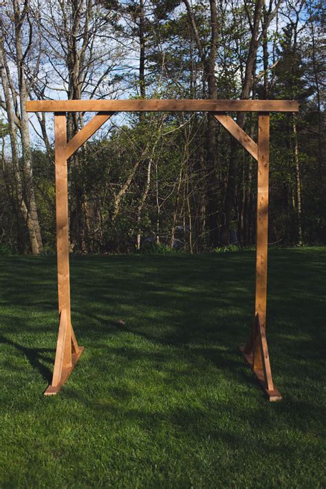 Imagine it in a area of your. DIY WOOD WEDDING ARBOR — The Sorry Girls | Diy wedding ...