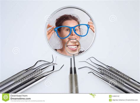 Dentist S Tools And Two Dentist S Mirrors With Woman S Smile Stock