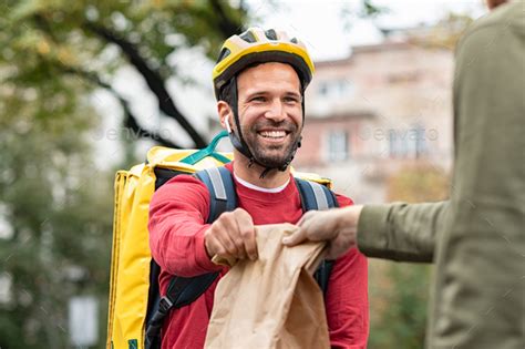 Delivery Man Giving Take Away Food Stock Photo By Rido81 Photodune