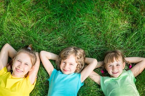 Premium Photo Group Of Happy Children Playing Outdoors Kids Having