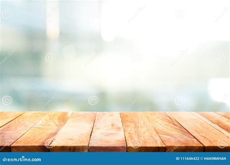 Wood Table Top On Blur Glass Window Wall Building Background Stock