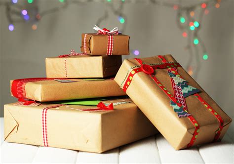 A japanese wrapping technique, furoshiki using paper and twine to wrap gifts putting little treats in a stocking different methods of making gift bags using tape, pictures and postcards. Eco-friendly gift wrap alternatives for the holidays