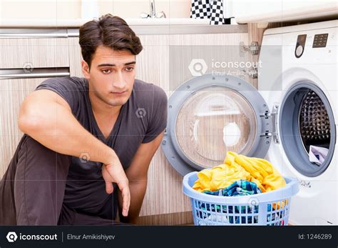 Premium Young Husband Man Doing Laundry At Home Photo Download In Png