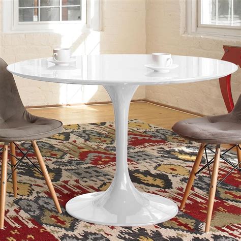 These tulip tables are inspired by eero saarinen's iconic 1956 design, but they cost far less than the original. Lacquered Tulip Table | Tulip dining table, Tulip table ...