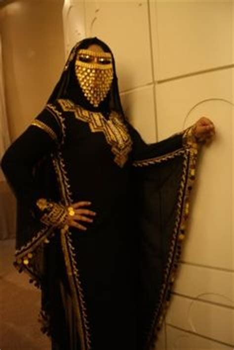 The females of the tribe wear a cape like cloth made up of assam muga silk. Head of an Arab girl. A figurative of gold hair jewelry ...