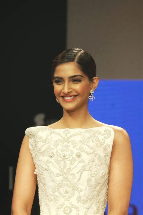 fighting the darkness sonam kapoor looks irresistibly sexy in white dress at india