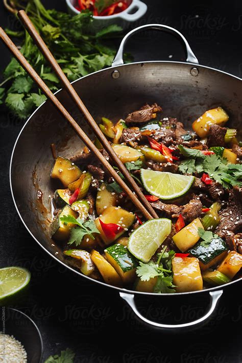 Tasty Beef Wok With Chopsticks By Stocksy Contributor Pietro Karras