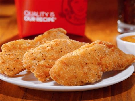 Chicken tenders cut in half. Wendy's new tenders are heavy on the chicken, light on the ...