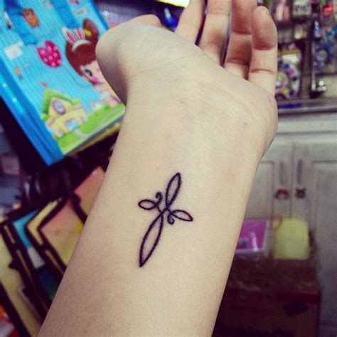 This tattoo is very neatly done on the wrist, which is a great placement idea for such a design. Pin on Tatoo tatoo