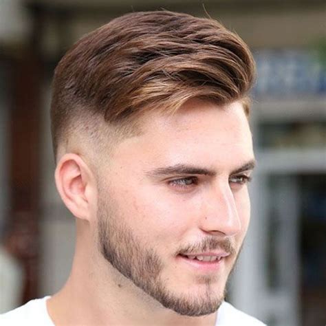 Usually the fade haircut consists of longest hairs on top which gradually decreases in length towards the nape of the neck and the sides. Comb Over Fade Haircut | Comb over fade haircut, Fade ...
