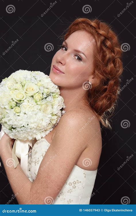 Young Beautiful Redhead Bride With Prom Hairdo And Bouckuet Stock Image Image Of Bouquet