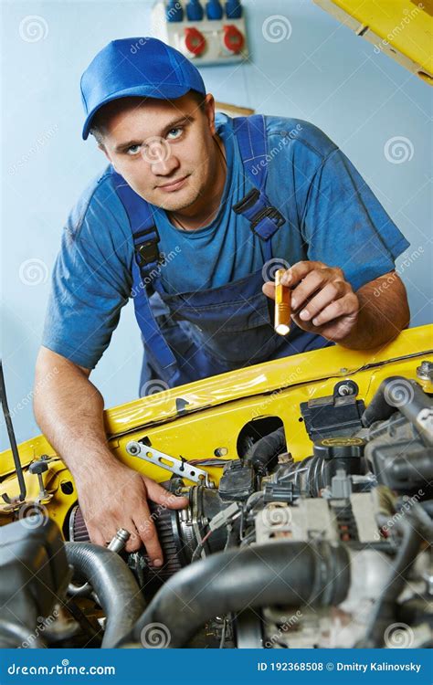 Auto Mechanic Repairman At Work With Car Engine Stock Photo Image Of