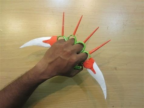 Very simply, you can make a folded paper sword in about 2 minutes. How to Make a Paper knuckles sword - Easy paper knife ...