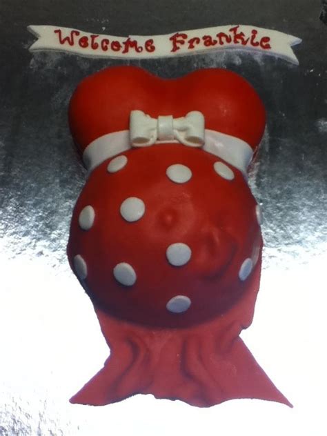 red and white pregnant belly cake