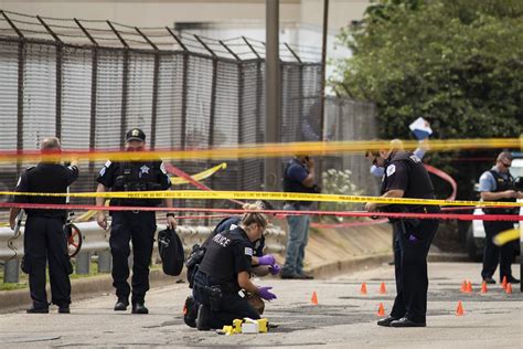 Carjacking suspect charged in shooting of 3 Chicago officers | AP News