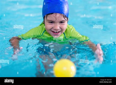 Boy In Swimming Pool Stock Photo Alamy