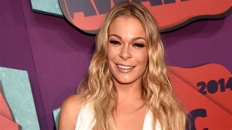 leann rimes displays very toned abs in revealing crop tops in show of gratitude hello