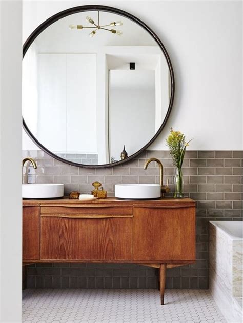 The Subtle Yet Dramatic Effect Of A Large Round Mirror The Simply