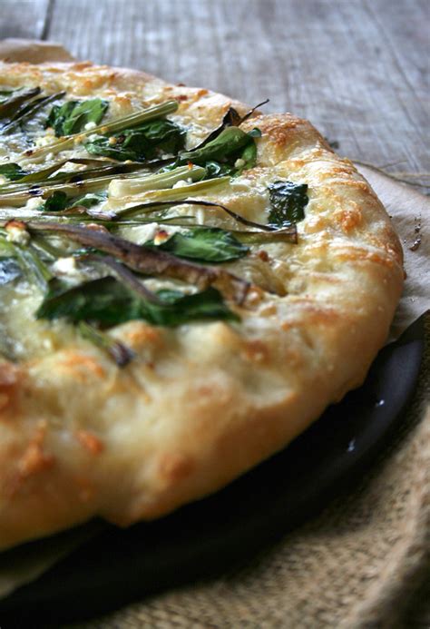 Roasted Garlic Pizza Topped With Grilled Green Onions Spinach And