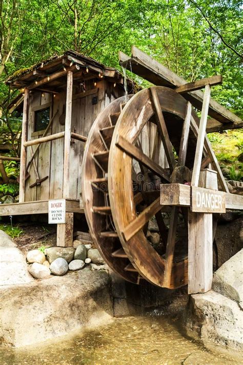 Old Wooden Water Mill With The Wheel Turning Stock Image Image 27221251