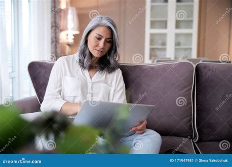 Calm Lady With Gadget Working At Home Stock Photo Stock Image Image