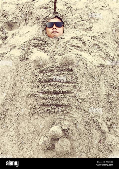 Is Buried In The Sand Hi Res Stock Photography And Images Alamy