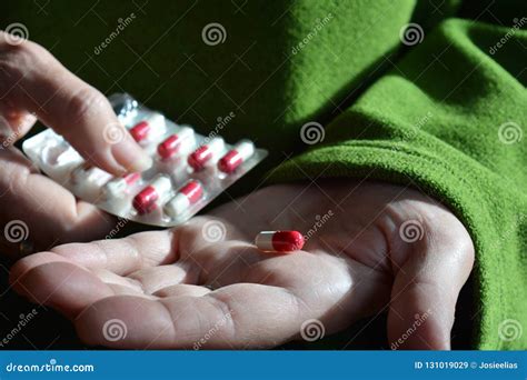 woman holding a blister pack of medication stock image image of illness hands 131019029