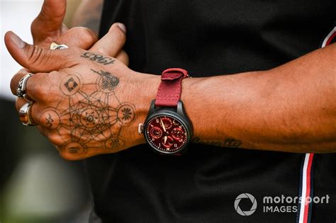 The formula one champion has many interesting tattoos, and one of the most intriguing ones just. Lewis Hamilton, Mercedes-AMG Petronas F1, hand tattoos at ...