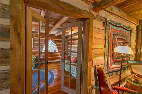 Vintage cabin with separate guest house. A Civil War-Era Log Home For Sale in West Virginia