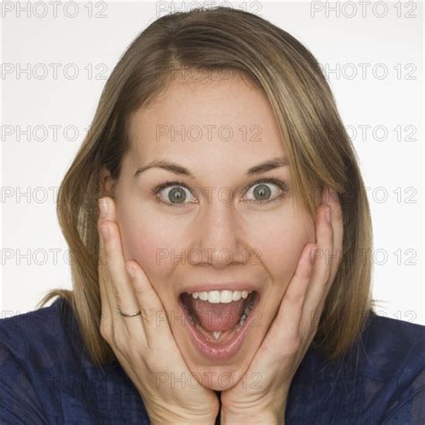 Close Up Of Woman Looking Surprised Photo12 Tetra Images