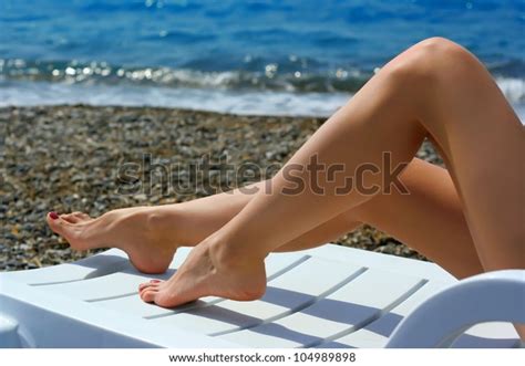 Beautiful Female Legs On Beach Stock Photo Edit Now