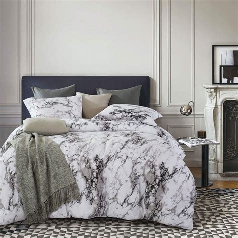 A king size bed provides more room for couples. Wake In Cloud - Marble Duvet Cover Set, Black White and ...