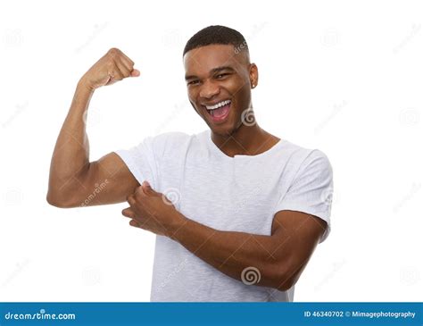 Happy Young Man Flexing Bicep Muscle Stock Photo Image Of Masculine