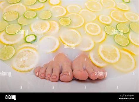 Girl Takes A Milk Bath With Lemons And Limes Citrus Spa Body Care