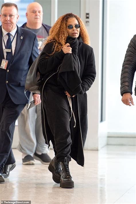 Janet Jackson Wraps Up Warm In Cosy Scarf And Edgy Platform Boots As