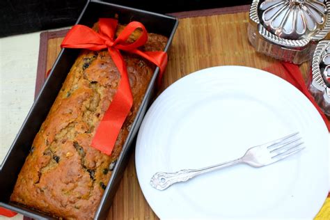 Leave to cool in the tin for 10 mins, then lift the cake out onto a wire rack, using the parchment to help you. Eggless Christmas Fruit Loaf Cake