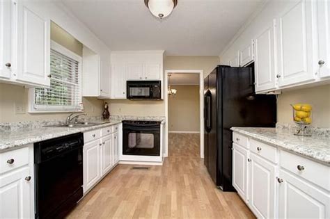 Say goodbye to a cluttered outdated kitchen and breathe new life into one of the most important rooms in your home. Hampton Bay 6 ft. Laminate Countertop in Typhoon Ice with ...