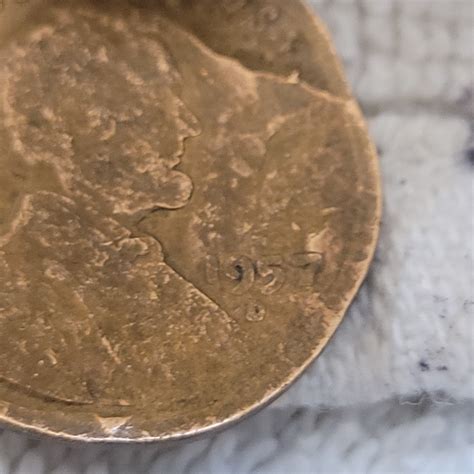 1957 D Wheat Penny Error. Can I upload a picture. It is in circulated
