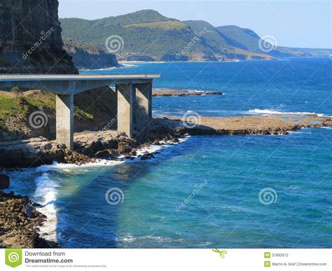Coastline With Sea Cliff Bridge In Australia Stock Photo