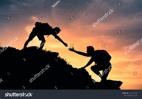 People Helping Each Other Mountain Helping Stock Photo Edit Now