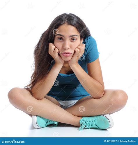 Bored Teenager Girl Sitting With Crossed Legs Stock Photo Image 44196627