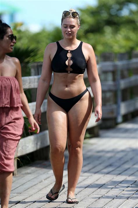 Iskra Lawrence Wears A Black Bikini While On The Beach During Swim Week