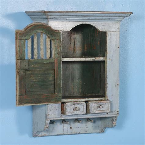 In this case, the wall cabinet doors are painted white, with yellow trim. Antique Blue Swedish Hanging Wall Cabinet, circa 1880 at ...