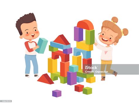 Boy And Girl Are Smiling And Building A Tower Of Childrens Blocks