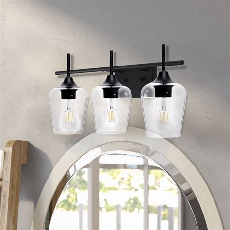 Clean lines offset the asymmetry of the frosted white glass shade and brings modern style to any space. Ebern Designs Herricks 3-Light Dimmable Matte Black Vanity Light & Reviews | Wayfair