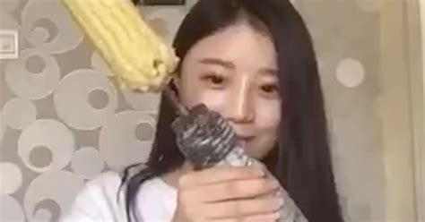 This Girl Ripping Her Hair Out During A Corn Drill Eating Challenge