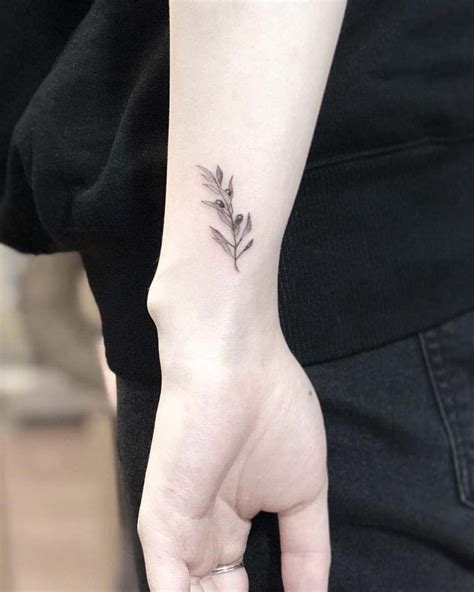 49 Beautiful Olive Branch Tattoo Designs And Meaning For 2020 Olive