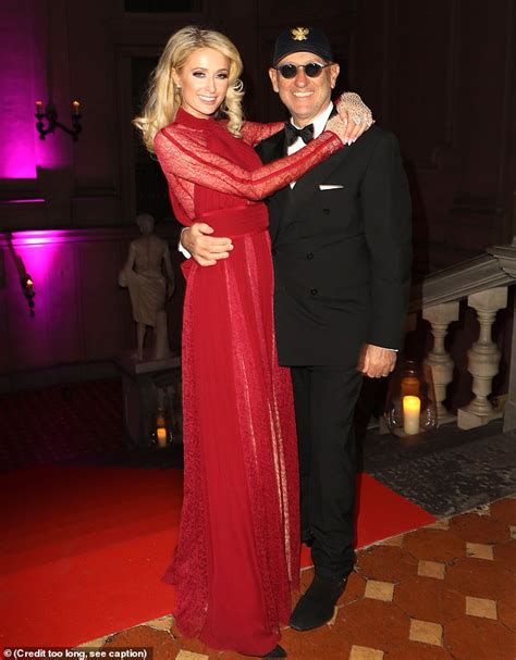 Paris Hilton Looks Ultra Glam In A Red Semi Sheer Gown As She Cosies Up To Model Jordan Barrett