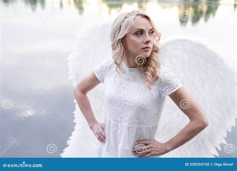 Woman With White Angel Wings Beautiful Blonde In Angel Costume Heaven